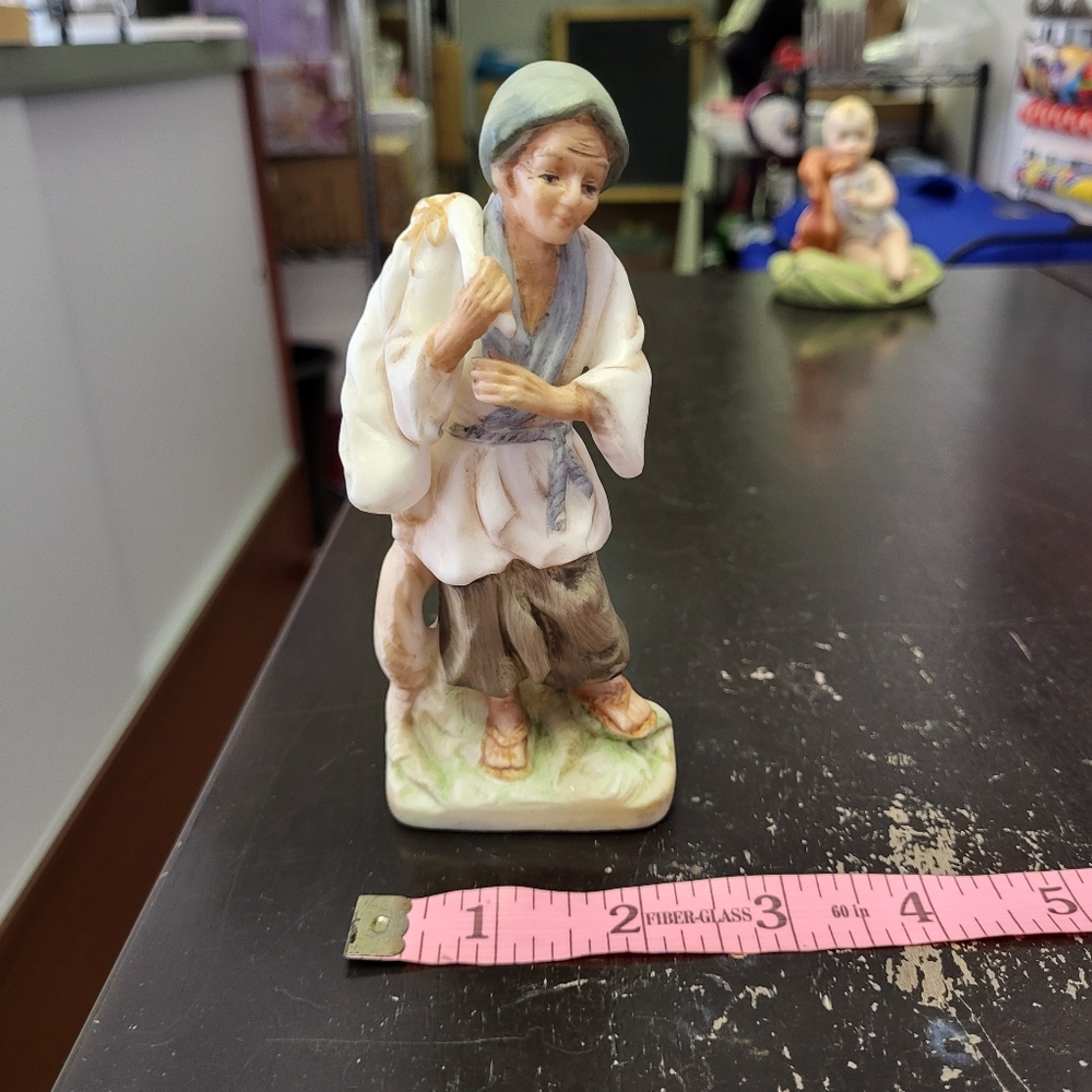 Ceramic farmer with original price tag